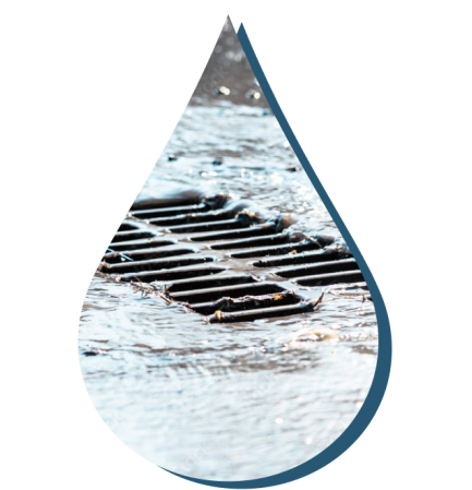 sewer with water flowing into it